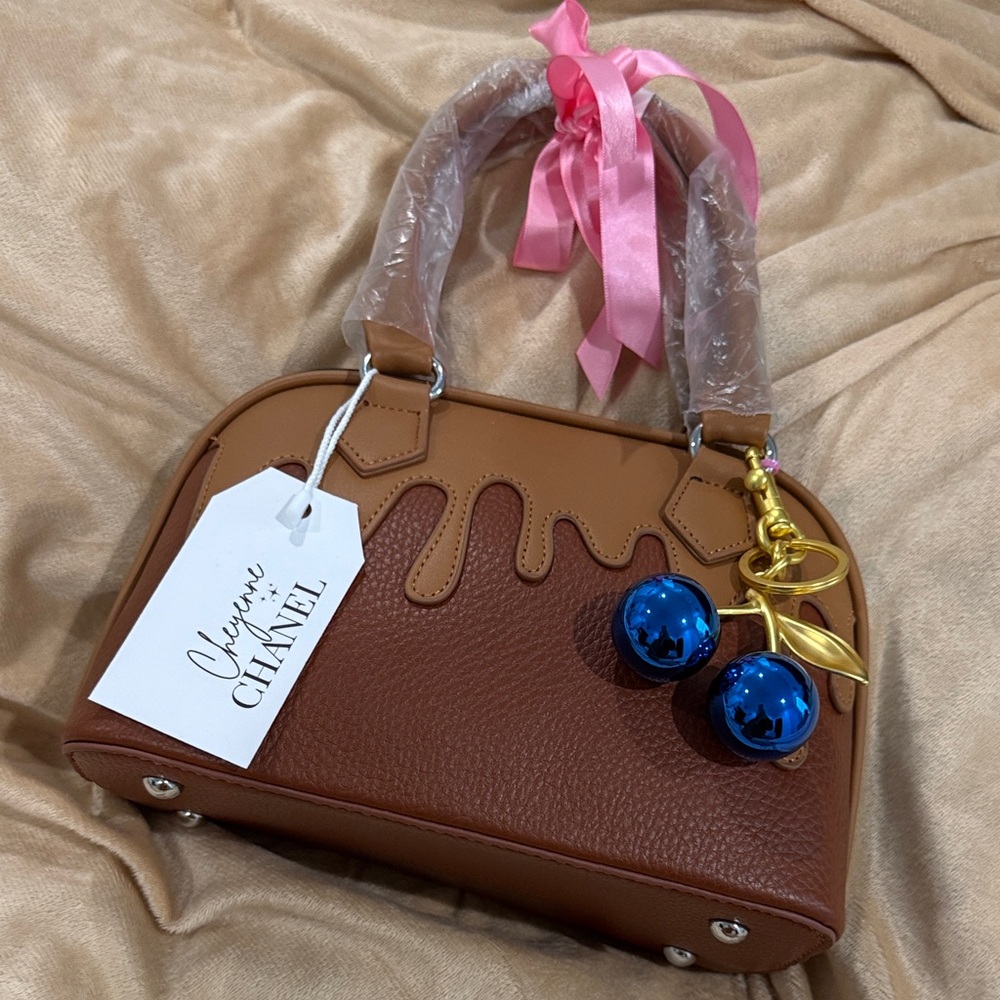 Cheyenne Chanel Tan and Brown Leather Satchel